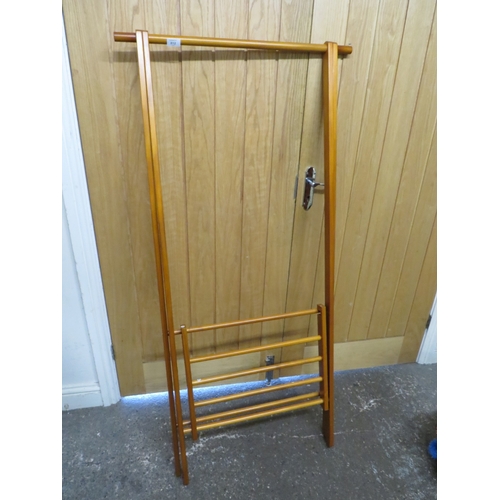 812 - A MODERN FOLDING WOODEN CLOTHES RAIL