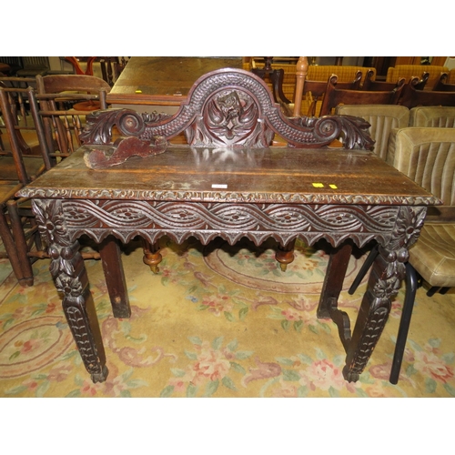 814 - A VICTORIAN CARVED OAK SIDE TABLE W-106 CM