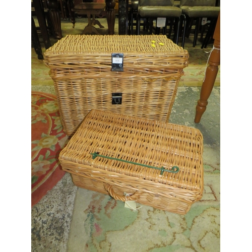 815 - A LARGE WICKER BASKET TOGETHER WITH A SMALLER WICKER HAMPER BASKET