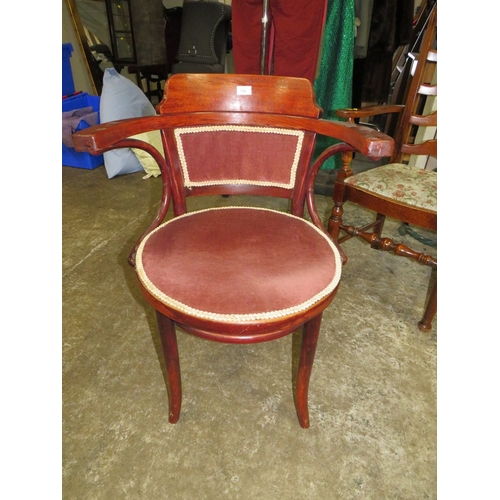 745 - A 20TH CENTURY OAK BENTWOOD ARMCHAIR