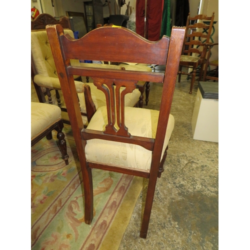 779 - AN EDWARDIAN MAHOGANY GENTLEMAN'S ARMCHAIR AND FOUR CHAIRS (5)