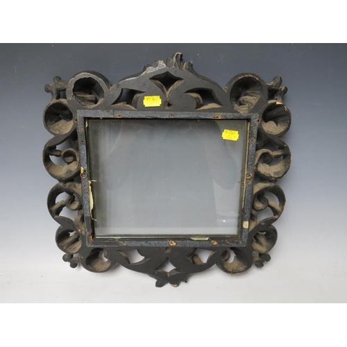 44 - A 19TH CENTURY CONTINENTAL EBONISED AND GILT CARVED DECORATIVE FRAME, glazed, frame W 7.5 cm, rebate... 