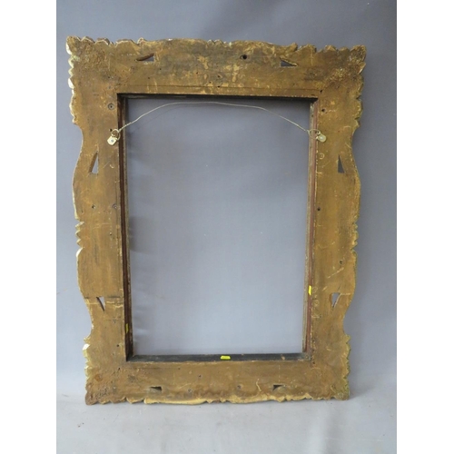 50 - A LATE 18TH / EARLY 19TH CENTURY CARVED WOODEN DECORATIVE GOLD FRAME, frame W 12 cm, rebate 65 x 47 ... 