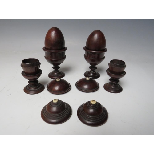 502 - A COLLECTION OF VARIOUS ITEMS OF TREEN, to include small lidded urns and two eggs