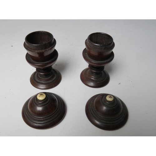 502 - A COLLECTION OF VARIOUS ITEMS OF TREEN, to include small lidded urns and two eggs