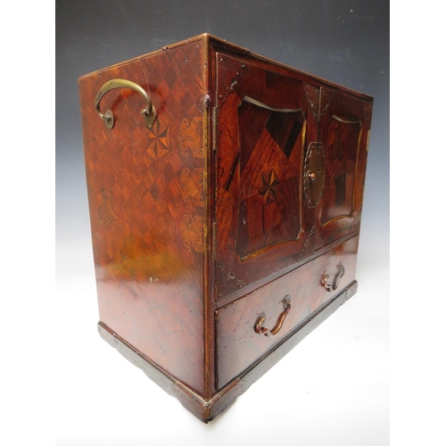 504 - A LATE 19TH / EARLY 20TH CENTURY CABINET WITH BRASS INLAY, twin brass handles, two doors opening to ... 