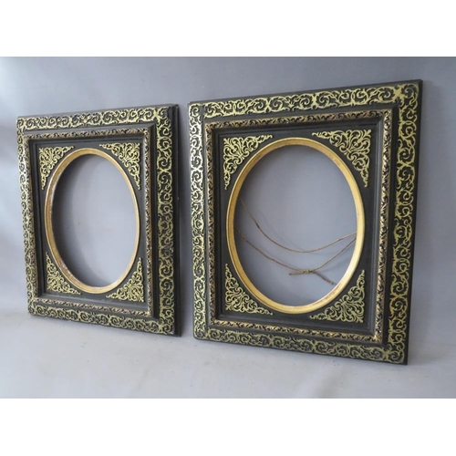 51 - A PAIR OF 19TH CENTURY EBONISED FRAMES, with gilt and oval inserts, frame W 8 cm, rebates 39 x 30 cm