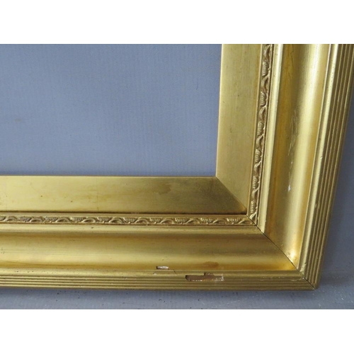 52 - A 19TH CENTURY GOLD FRAME, with decoration to inner edge and gold slip, frame W 6.5 cm, slip rebate ... 