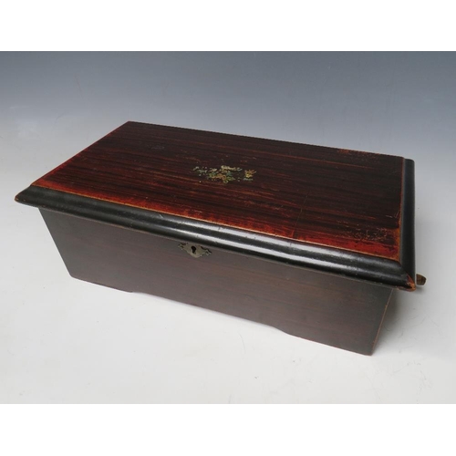 525 - A SWISS MUSIC BOX, the simulated rosewood case opening to reveal a small 31/2