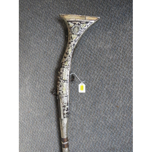 528 - A 19TH CENTURY EASTERN FLINTLOCK RIFLE, with bone inlay and white metal decoration, having metal ram... 