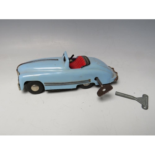 534 - A VINTAGE CLOCKWORK TINPLATE MINIC SPORTS CAR, with horn, box and key, L 17 cm, A/F