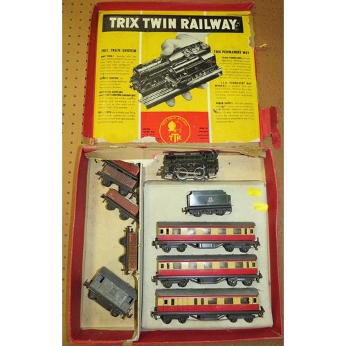 539 - A BOXED TRIX TWIN RAILWAY SET, with various coaches, trucks and locomotive