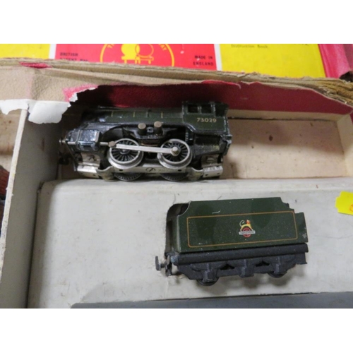 539 - A BOXED TRIX TWIN RAILWAY SET, with various coaches, trucks and locomotive