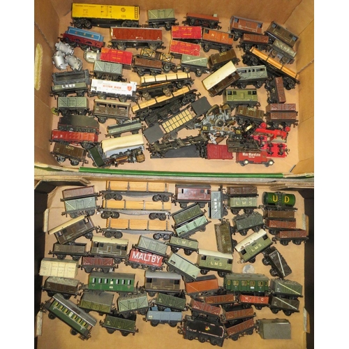 542 - TWO BOXES CONTAINING A SELECTION OF HORNBY AND TRIX MODEL RAILWAY TRUCKS, TENDERS & RUNNING GEAR