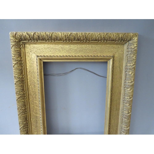 55 - A 19TH CENTURY GOLD WATTS FRAME, with acanthus leaf design to outer edge, frame W 5 cm, rebate 40 x ... 