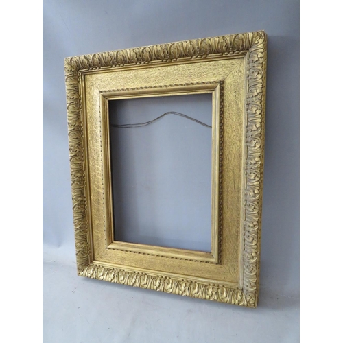 55 - A 19TH CENTURY GOLD WATTS FRAME, with acanthus leaf design to outer edge, frame W 5 cm, rebate 40 x ... 