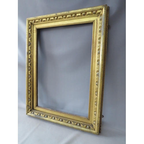 56 - A 19TH CENTURY GOLD FRAME, with carved wood inset and gold slip, frame W 8 cm, slip rebate 82 x 57 c... 