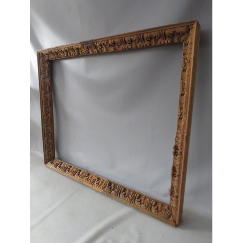 57 - A LATE 18TH / EARLY 19TH CENTURY CARVED WOODEN DECORATIVE FRAME, frame W 6 cm, rebate 98 x 77 cm