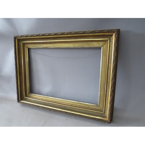 60 - A 19TH CENTURY GOLD FRAME, with reeded inner and acanthus leaf design to outer edge, with gold slip,... 