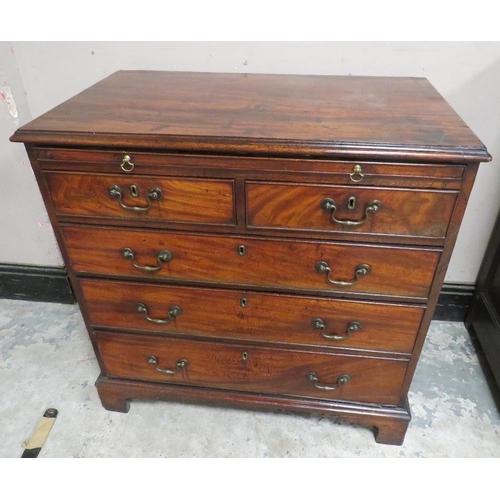 605 - A 19TH CENTURY MAHOGANY BACHELORS CHEST OF DRAWERS OF SLIM PROPORTIONS, having brushing slide, two s... 