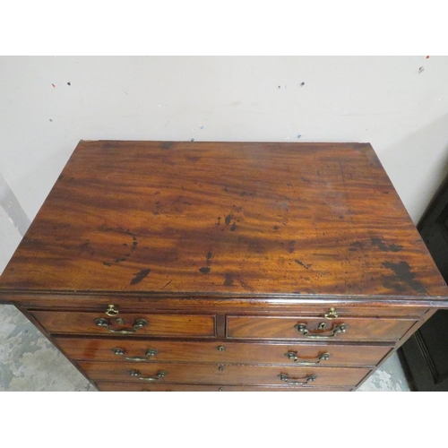 605 - A 19TH CENTURY MAHOGANY BACHELORS CHEST OF DRAWERS OF SLIM PROPORTIONS, having brushing slide, two s... 