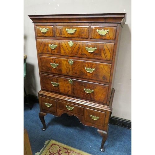 609 - AN EARLY 19TH CENTURY WALNUT CHEST ON STAND, the upper section with three short above three lower gr... 