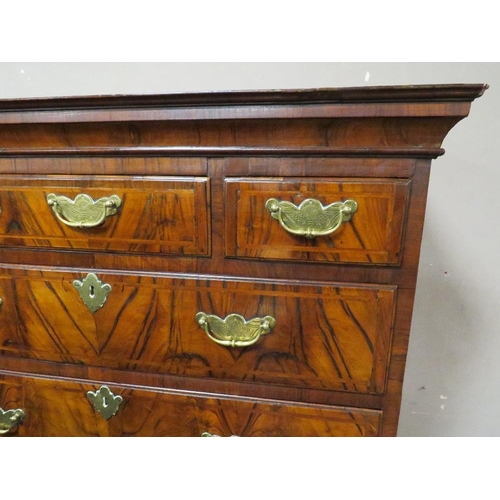 609 - AN EARLY 19TH CENTURY WALNUT CHEST ON STAND, the upper section with three short above three lower gr... 