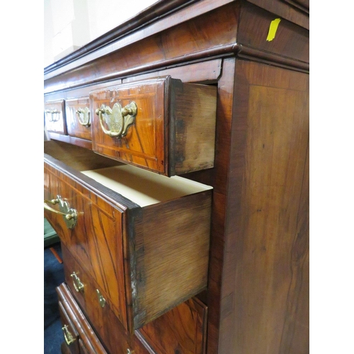 609 - AN EARLY 19TH CENTURY WALNUT CHEST ON STAND, the upper section with three short above three lower gr... 