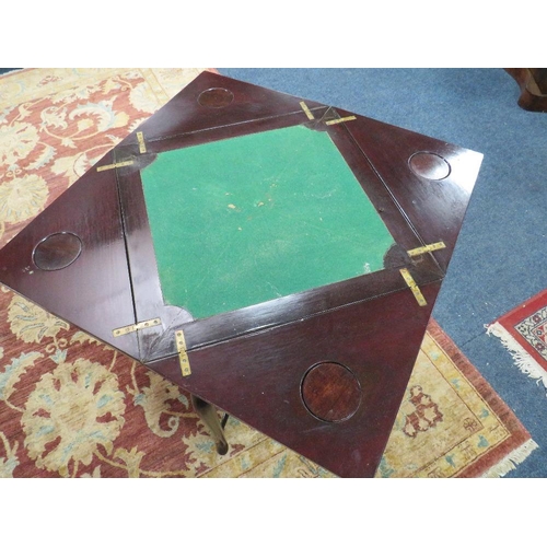 611 - AN EDWARDIAN MAHOGANY ENVELOPE GAMES TABLE, the leaves opening to a baize lined interior, with singl... 