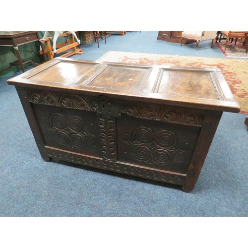 613 - AN 18TH CENTURY OAK CARVED COFFER, W 123 cm