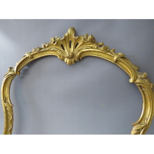 62 - A LATE 19TH CENTURY GOLD CARVED WOODEN DECORATIVE ROCOCO FRAME, frame W 4.5 cm, rebate 79 x 66 (wide... 