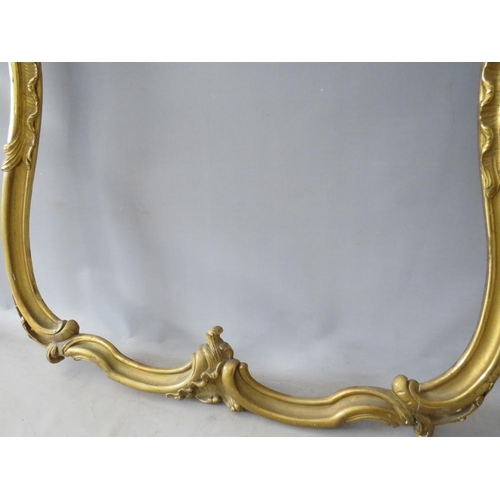 62 - A LATE 19TH CENTURY GOLD CARVED WOODEN DECORATIVE ROCOCO FRAME, frame W 4.5 cm, rebate 79 x 66 (wide... 