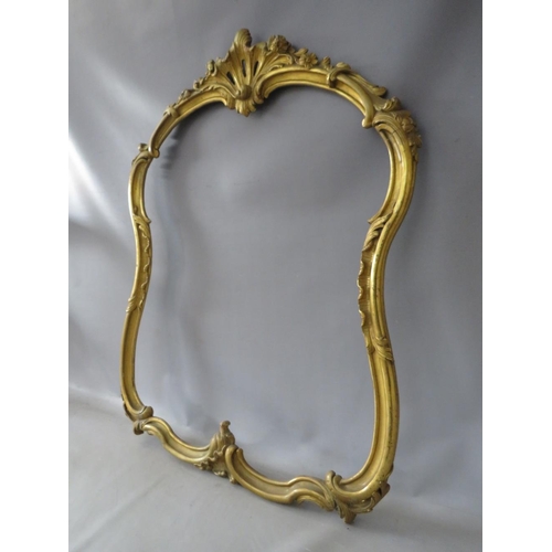 62 - A LATE 19TH CENTURY GOLD CARVED WOODEN DECORATIVE ROCOCO FRAME, frame W 4.5 cm, rebate 79 x 66 (wide... 