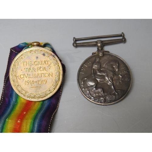 527 - TWO MEDALS TO PTE. G.W. EVANS. 7-LOND.R. 356213, together with a hallmarked silver artillery type ba... 