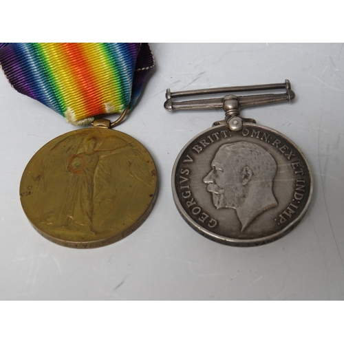 527 - TWO MEDALS TO PTE. G.W. EVANS. 7-LOND.R. 356213, together with a hallmarked silver artillery type ba... 