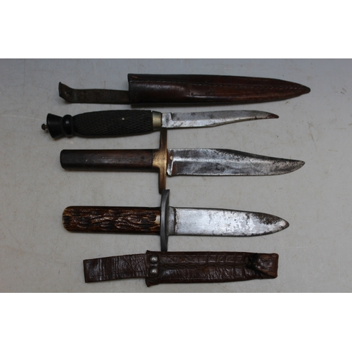 531 - A SCOUT KNIFE, Bowie knife and an antique style dagger (3)