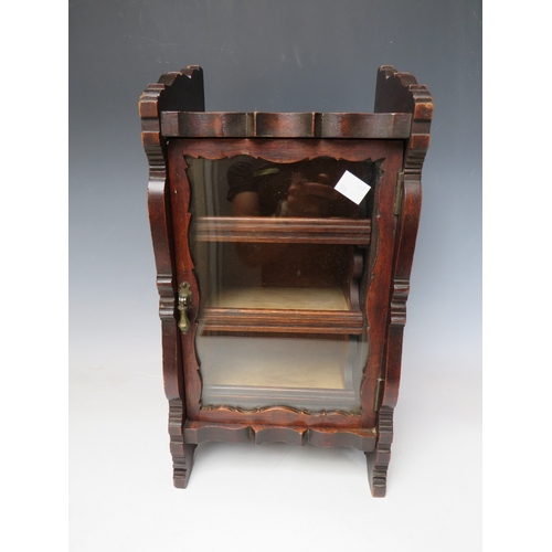 508 - A LATE 19TH CENTURY MAHOGANY GLAZED TABLE TOP CABINET, with single door, three interior pull-out tra... 