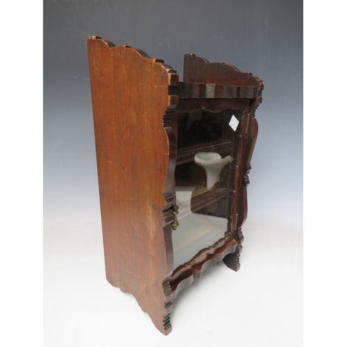 508 - A LATE 19TH CENTURY MAHOGANY GLAZED TABLE TOP CABINET, with single door, three interior pull-out tra... 