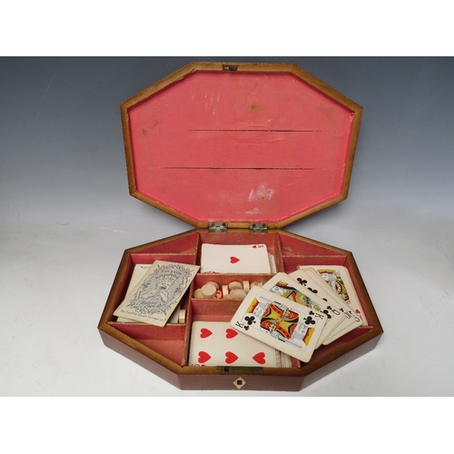 509 - A GEORGIAN PARTRIDGE WOOD OCTAGONAL CARD/GAMES BOX, with inlaid and crossbanded detail, W 30 cm