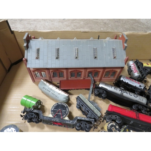 554 - A BOX CONTAINING AN ASSORTMENT OF MODEL RAILWAY CARRIAGES, signals, buildings and engines