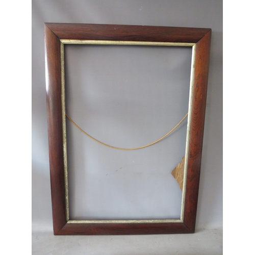 37 - THREE 19TH CENTURY ROSEWOOD PICTURE FRAMES, together with a mahogany picture frame, average frame W ... 