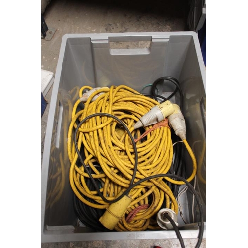 512 - A BOX CONTAINING VARIOUS POWER TOLLS AND EXTENSION LEADS