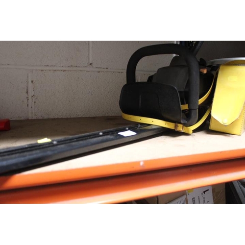 520 - A TITAN TTL531 HDE PETROL HEDGE CUTTER WITH A CASED LOOP TESTER