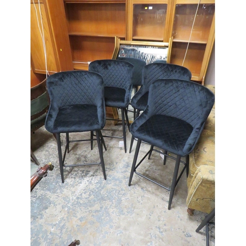 607 - A SET OF FOUR MODERN BLACK KITCHEN STOOLS