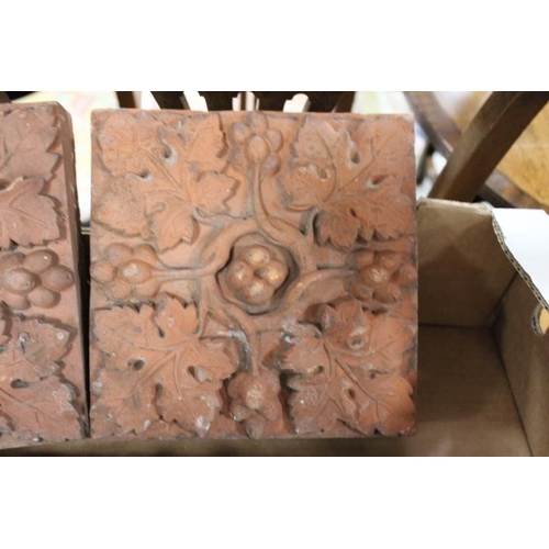 63 - A SELECTION OF SIX ASSORTED VINTAGE TERRACOTTA PATTERNED TILES