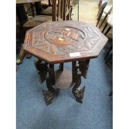 660 - AN EASTERN CARVED TWO TIER OCCASIONAL TABLE