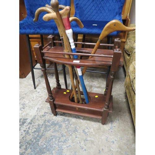 685 - A VINTAGE STICKSTAND WITH ASSORTED STICKS