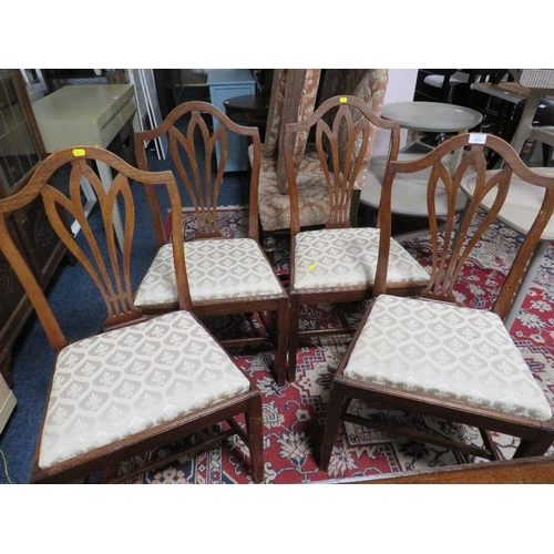 690 - A SET OF FOUR MAHOGANY DINING CHAIRS