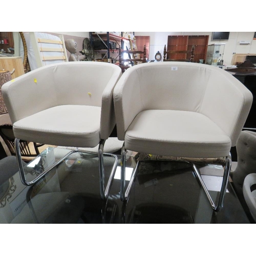 698 - A PAIR OF MODERN UPHOLSTERED TUB STYLE CHAIRS