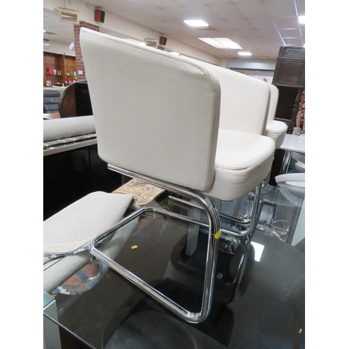 698 - A PAIR OF MODERN UPHOLSTERED TUB STYLE CHAIRS